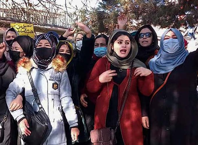 taliban order ngos to stop women staff from working over hijab